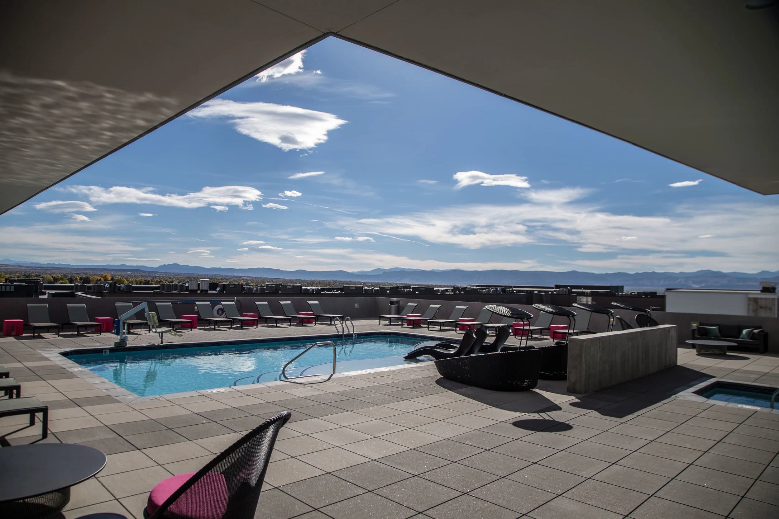 Rooftop amenity deck overlooking the Rockies