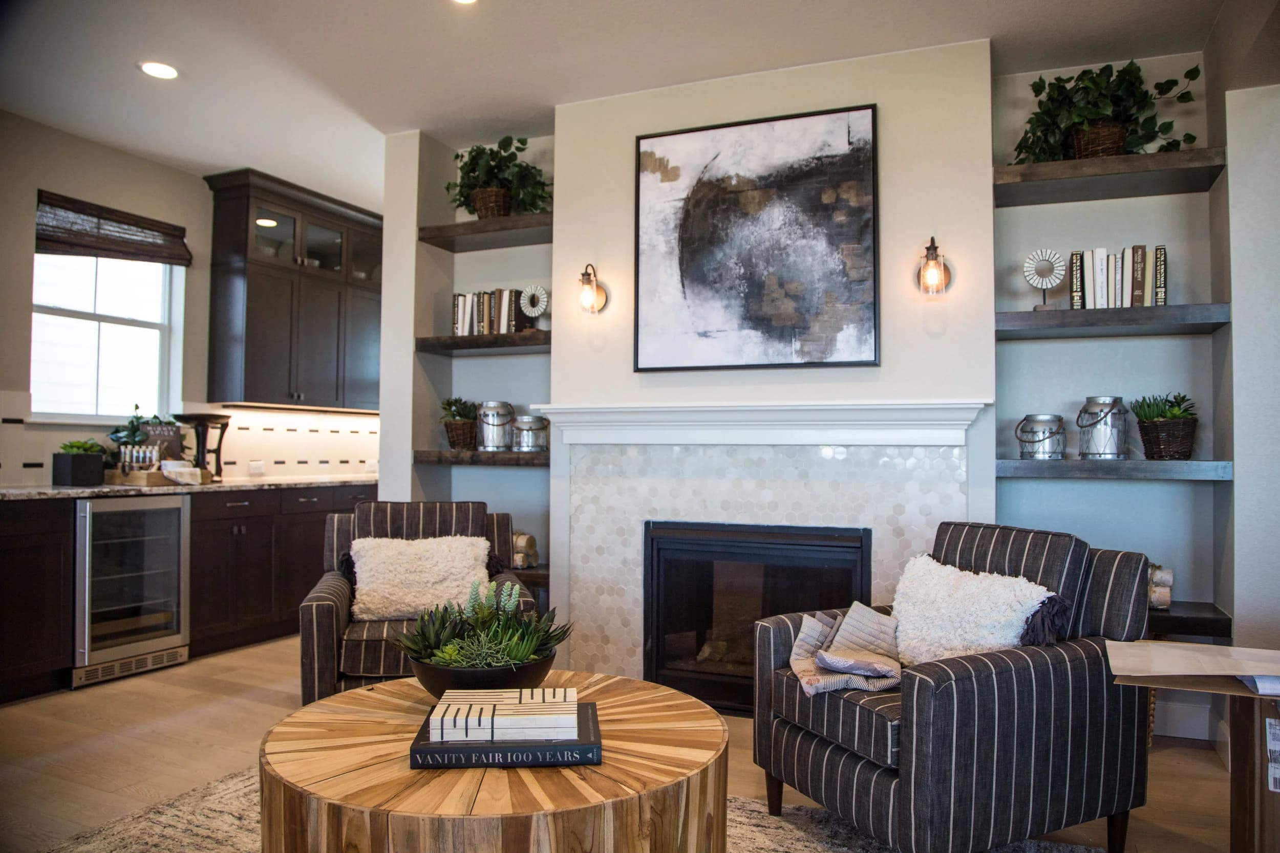 Living room with fireplace, built-ins, and recessed lighting